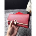 Women's Ferragamo wallet in red with gold Gancio buckle