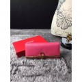 Women's Ferragamo wallet in pink color with gold Gancio buckle